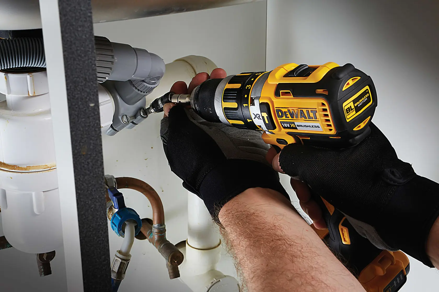 Graphic showing DEWALT XTREME Sub-Compact Series branding with the slogan 'Compact and Performance Packed' on a yellow background.